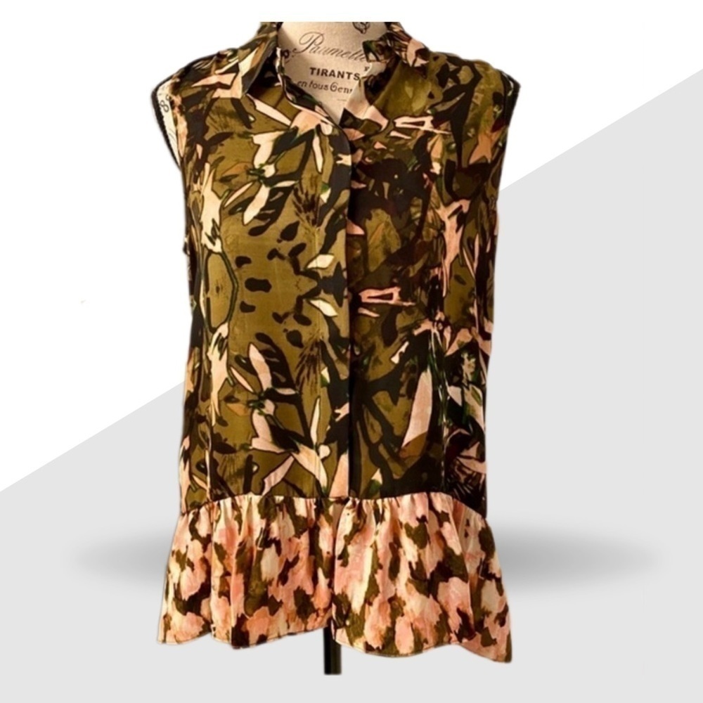 Katherine Malandrino woman’s size M abstract print peplum sleeveless blouse